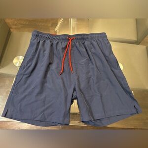 Men’s bathing suit. Navy with red string never worn!